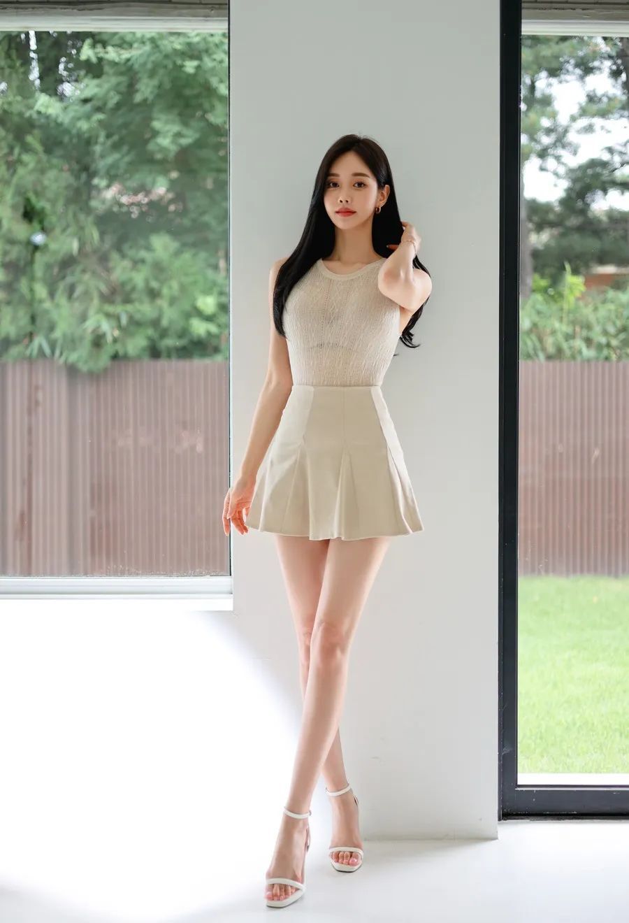 孙允珠图鉴872，薄透杏色无袖针织衫杏色短裙